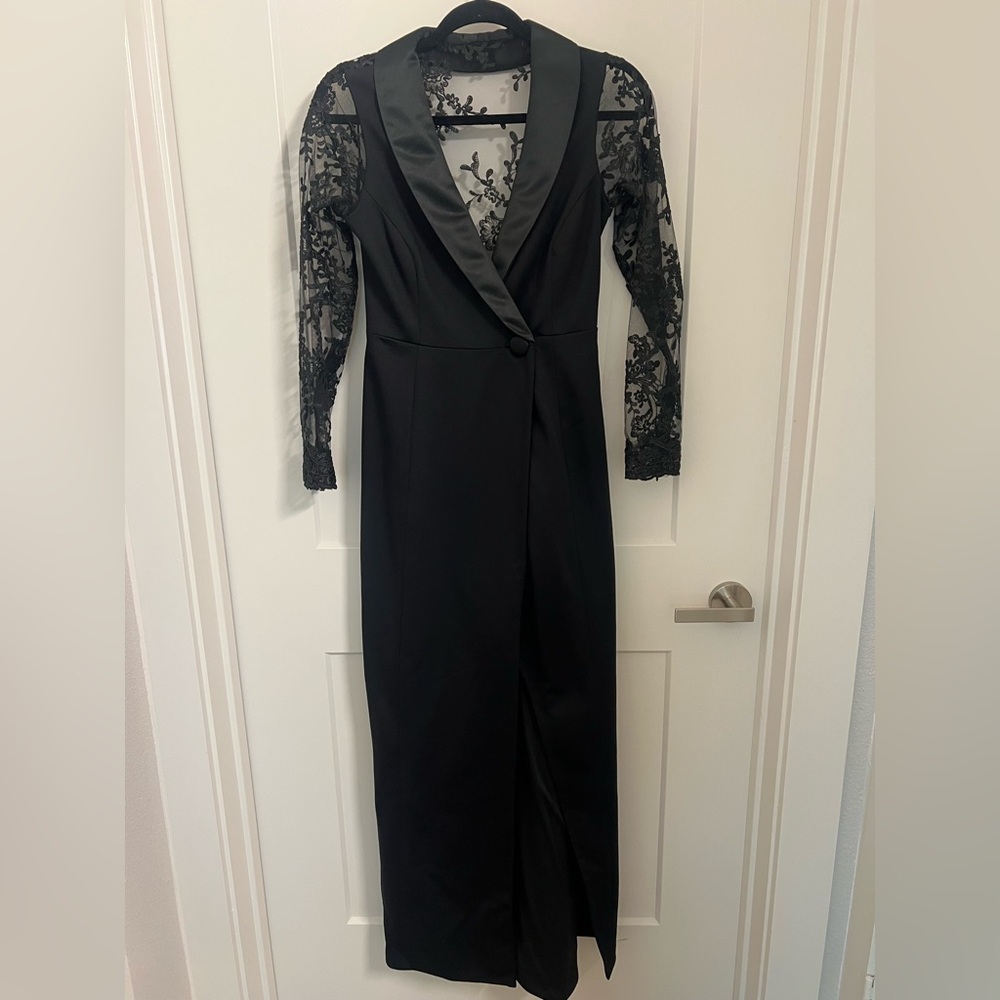 Tuxedo like straight black dress with lace.